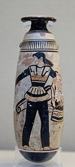Amazon wearing trousers and carrying a shield with an attached patterned cloth and a quiver. Dated 470 BC and housed at the British Museum